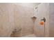Tiled walk-in shower with built-in bench and rainfall shower head at 2505 Links Dr, Laughlin, NV 89029