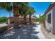 A charming walkway lined with desert landscaping leads to this lovely home and garage at 2505 Links Dr, Laughlin, NV 89029