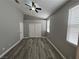Bedroom featuring ceiling fan, natural light, and closet doors at 2694 Hillgrass Rd, Las Vegas, NV 89123
