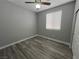 Bedroom featuring ceiling fan, natural light, and sleek flooring at 2694 Hillgrass Rd, Las Vegas, NV 89123