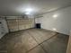 Spacious two car garage with painted floors and garage door at 2694 Hillgrass Rd, Las Vegas, NV 89123
