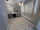 Bright eat-in kitchen featuring a cozy bench, and plantation shutters for natural light at 2694 Hillgrass Rd, Las Vegas, NV 89123