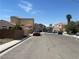 Neighborhood street view showcasing the surrounding homes in a residential area at 2694 Hillgrass Rd, Las Vegas, NV 89123