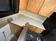 The kitchen features oak cabinets and a laminate countertop at 2711 Morning Break Ct, Las Vegas, NV 89142