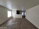 Spacious living room with neutral paint and sleek hardwood flooring at 2711 Morning Break Ct, Las Vegas, NV 89142