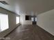 Spacious living room with neutral paint and sleek hardwood flooring at 2711 Morning Break Ct, Las Vegas, NV 89142