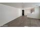 Spacious living room with neutral paint and sleek hardwood flooring at 2711 Morning Break Ct, Las Vegas, NV 89142