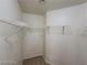 Walk-in closet featuring installed shelving on three sides at 2711 Morning Break Ct, Las Vegas, NV 89142