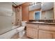 Bathroom features a single sink vanity and shower over tub with glass doors at 2741 Chokecherry Ave, Henderson, NV 89074