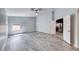 Spacious bedroom with wood floors, ceiling fan, and ample natural light at 2741 Chokecherry Ave, Henderson, NV 89074