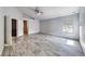 Large primary bedroom featuring wood floors, ceiling fan, and natural light at 2741 Chokecherry Ave, Henderson, NV 89074