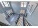 Elegant foyer features soaring ceilings, large windows with natural light, and a staircase with stylish railing, creating a grand entrance at 2741 Chokecherry Ave, Henderson, NV 89074