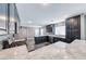 Beautiful kitchen with marble countertops, black cabinets, and stainless steel appliances at 2741 Chokecherry Ave, Henderson, NV 89074