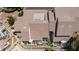 An aerial shot provides an overview of the roof, the patio space, and the surrounding landscape at 2749 Lodestone Dr, Las Vegas, NV 89117