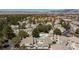 An elevated shot showcases the neighborhood's layout and the community swimming pool at 2749 Lodestone Dr, Las Vegas, NV 89117