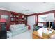 Bedroom with built-in shelves, large window, closet, and desk with good natural light at 2749 Lodestone Dr, Las Vegas, NV 89117