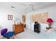 Bedroom with neutral colors, ceiling fan, dresser, and natural light from a window at 2749 Lodestone Dr, Las Vegas, NV 89117