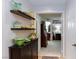 View of hallway with decoratively placed vases and bowls with an ensuite view to bedroom at 2749 Lodestone Dr, Las Vegas, NV 89117