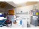 Laundry room equipped with appliances and shelving at 2749 Lodestone Dr, Las Vegas, NV 89117