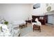 Open concept living room featuring tile floors, high ceilings, and access to kitchen at 2749 Lodestone Dr, Las Vegas, NV 89117