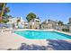 Enjoy a refreshing swim in the community pool with lounge chairs, a spa, and a covered seating area at 2749 Lodestone Dr, Las Vegas, NV 89117
