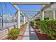 This charming walkway is surrounded by beautiful greenery and leads to the refreshing pool at 2749 Lodestone Dr, Las Vegas, NV 89117