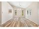 Dining room with updated flooring, neutral paint, and modern light fixture at 2836 Linkview Dr, Las Vegas, NV 89134