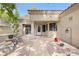 Inviting front porch with decorative elements and a welcoming entryway for a cozy curb appeal at 2836 Linkview Dr, Las Vegas, NV 89134