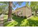 Charming home exterior showcasing mature landscaping, green grass, and a cozy facade at 2836 Linkview Dr, Las Vegas, NV 89134