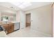 Practical kitchen area with wooden cabinets, stainless steel appliances, and ample counter space for cooking at 2836 Linkview Dr, Las Vegas, NV 89134