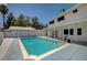 Sparkling backyard pool beside the house, near an accessory building, offering a private retreat at 3143 El Chico Ct, Las Vegas, NV 89120