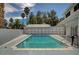 Swimming pool in the backyard with well-maintained landscaping, a perfect oasis for relaxation and recreation at 3143 El Chico Ct, Las Vegas, NV 89120