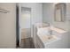 Bathroom with walk-in tub and updated vanity at 3143 El Chico Ct, Las Vegas, NV 89120
