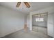 Bedroom features a sliding mirrored closet and a connecting door at 3143 El Chico Ct, Las Vegas, NV 89120