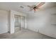 Bright bedroom featuring a mirrored closet and simple design at 3143 El Chico Ct, Las Vegas, NV 89120