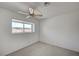 Bedroom featuring a window for natural light and a simple design at 3143 El Chico Ct, Las Vegas, NV 89120