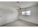 Cozy bedroom with ceiling fan, a window for natural light and a simple design at 3143 El Chico Ct, Las Vegas, NV 89120
