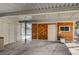 Carport with wooden doors leading to backyard area and pool at 3143 El Chico Ct, Las Vegas, NV 89120