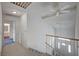 Hallway featuring access to rooms and a staircase at 3143 El Chico Ct, Las Vegas, NV 89120