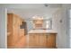 Spacious kitchen with light wood cabinets, stainless steel appliances, and center island at 3143 El Chico Ct, Las Vegas, NV 89120