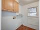 The laundry room features tile flooring, utility sink, and storage at 3143 El Chico Ct, Las Vegas, NV 89120