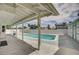 Inviting backyard pool and patio area, great for outdoor relaxation and entertaining with a covered patio at 3143 El Chico Ct, Las Vegas, NV 89120