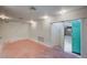 Renovated room with new paint, modern lighting and doorway to additional storage at 3143 El Chico Ct, Las Vegas, NV 89120