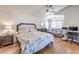Bright bedroom with a ceiling fan, a comfy bed, and two windows for natural light at 3440 Meridale Dr, Las Vegas, NV 89117