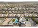 A planned community features a modern home with pool and turf surrounded by desert landscaping at 4050 N Tomsik St, Las Vegas, NV 89129