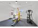 Well-lit exercise room with ceiling fan and a variety of fitness equipment for a complete workout at 4050 N Tomsik St, Las Vegas, NV 89129