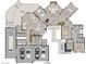 Floorplan of first floor highlighting kitchen, living room, primary bedroom, and garages at 4050 N Tomsik St, Las Vegas, NV 89129