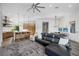 Bright, open-concept living room featuring hardwood floors and a seamless flow into the modern kitchen at 4050 N Tomsik St, Las Vegas, NV 89129