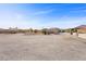Vacant lot with gravel and plenty of space for new landscaping at 4050 N Tomsik St, Las Vegas, NV 89129