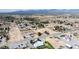 Expansive aerial view of a tranquil neighborhood showing the available homesites and mountain backdrop at 480 China St, Pahrump, NV 89048